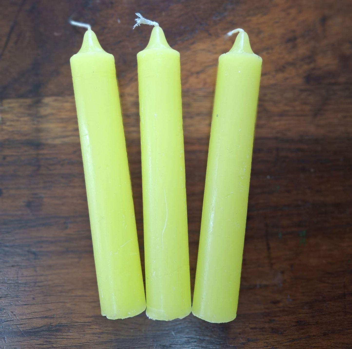 Plain yellow candle – for clarity, joy, positivity, and uplifting ambiance.