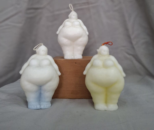 Sculpted standing feminine candles in grey and white, celebrating confidence, self-love, and divine feminine strength through soft, curvy forms and minimalist design.