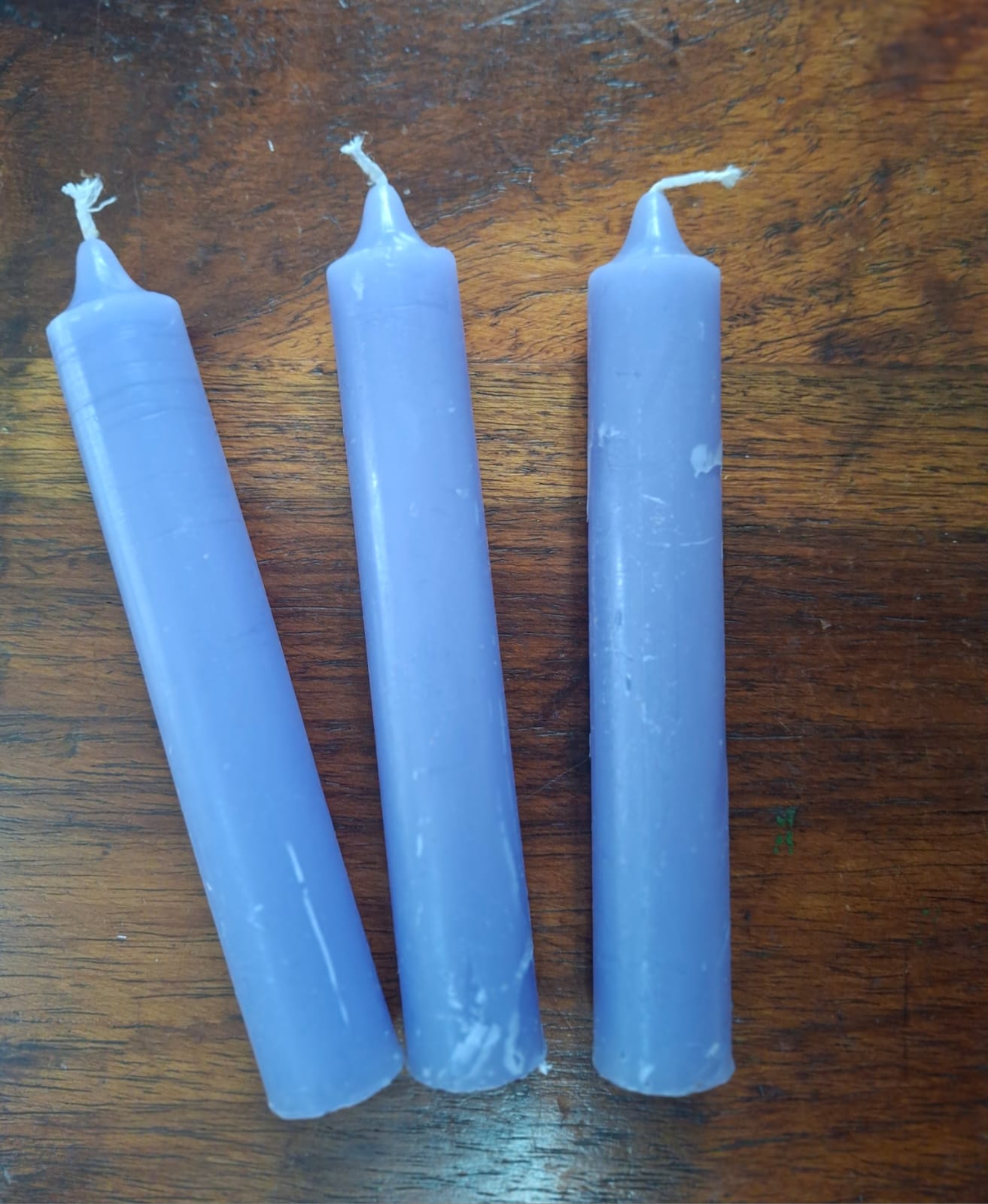 Plain lilac candle – for peace, intuition, and creating a calm, serene ambiance.