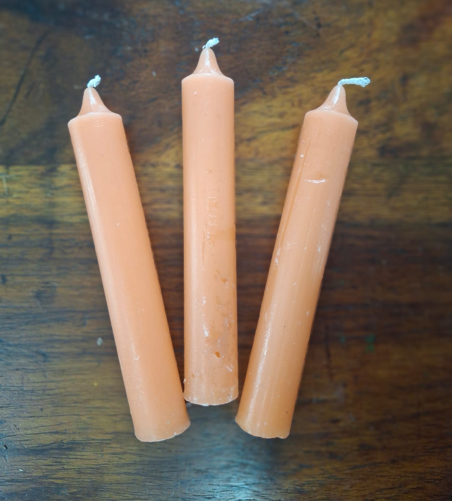 Plain orange candle – for energy, creativity, motivation, and uplifting ambiance.