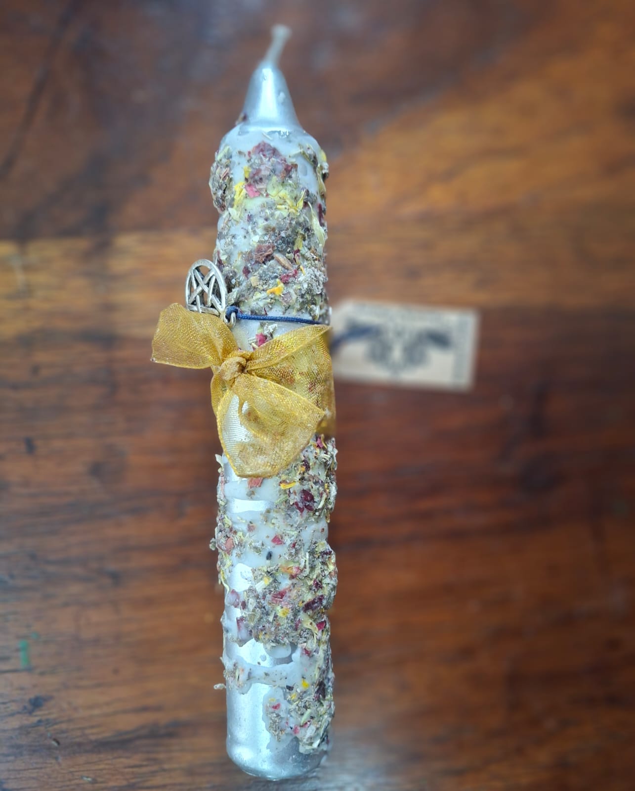 Silver dressed candle – candle for clarity, intuition, and spiritual connection.