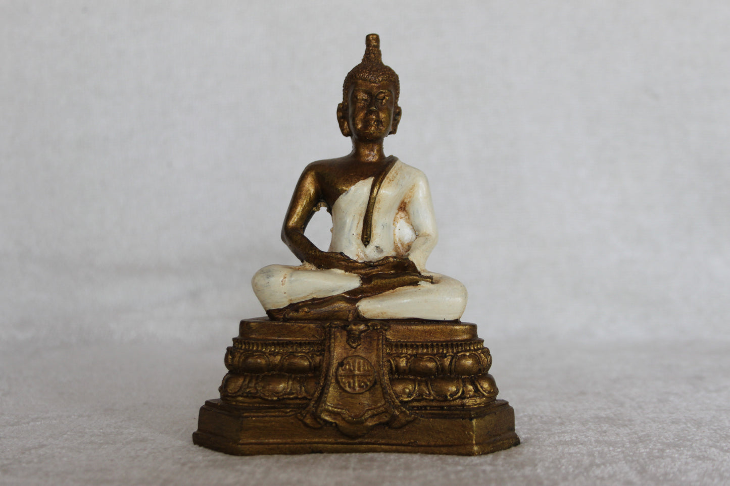 White and Gold Meditating Buddha